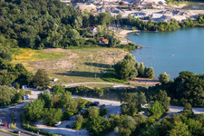Sunbathing lawn at Epplesee from the north in the district Silberstreifen in Rheinstetten in the state Baden-Wuerttemberg, Germany