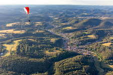 Paraglider over the Wieslautertal in the Palatinate Forest in Rumbach in the state Rhineland-Palatinate, Germany