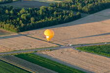 Landing of two hot air balloons "Pfalzgas in Winden in the state Rhineland-Palatinate, Germany