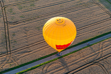 Oblique view of Landing of two hot air balloons "Pfalzgas in Winden in the state Rhineland-Palatinate, Germany