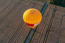 Drone recording of Landing of two hot air balloons "Pfalzgas in Winden in the state Rhineland-Palatinate, Germany