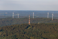 Mast of the Hardberg television transmitter in front of the Stillfüssel wind farm in the district Ober-Abtsteinach in Abtsteinach in the state Hesse, Germany