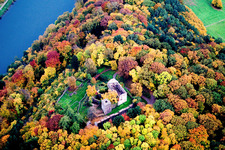 Ruins and remains of the walls of the former Minneburg castle in the autumn forest above the Neckar in the district Neckarkatzenbach in Neunkirchen in the state Baden-Wuerttemberg, Germany