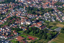 Oblique view of St. Paul's Abbey Herxheim in Herxheim bei Landau in the state Rhineland-Palatinate, Germany