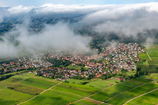 Aerial view of Village on the edge of the Pfläzerwald from the northeast under clouds in Klingenmünster in the state Rhineland-Palatinate, Germany