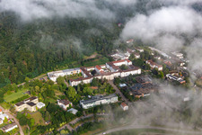 Dense clouds over the Palatinate Hospital for Psychiatry and Neurology in Klingenmünster in the state Rhineland-Palatinate, Germany from above