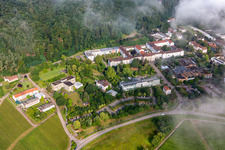 Dense clouds over the Palatinate Hospital for Psychiatry and Neurology in Klingenmünster in the state Rhineland-Palatinate, Germany out of the air