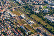 Building of the Police Directorate Police and Criminal Inspectorate and the Industrial Estate Metall Landau on Paul-von-Denis-Straße along the railway line in the district Queichheim in Landau in der Pfalz in the state Rhineland-Palatinate, Germany