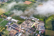Industrial estate Industriestraße under clouds in the district Billigheim in Billigheim-Ingenheim in the state Rhineland-Palatinate, Germany