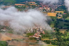 Village hidden under clouds from the east in the district Mühlhofen in Billigheim-Ingenheim in the state Rhineland-Palatinate, Germany