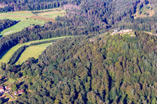 Cramerhaus hut and game restaurant at the foot of the Lindelbrunn castle ruins in Vorderweidenthal in the state Rhineland-Palatinate, Germany from above