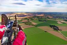 View of the Garzweiler open-cast lignite mine in the district Immerath in Erkelenz in the state North Rhine-Westphalia, Germany