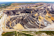 Drone recording of Interestingly colored layers of overburden and coal in the Garzweiler opencast lignite mine in the district Borschemich in Erkelenz in the state North Rhine-Westphalia, Germany