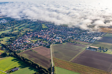 Village on the edge of the clouds in Steinweiler in the state Rhineland-Palatinate, Germany