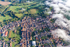 Aerial view of Village on the edge of the clouds in Steinweiler in the state Rhineland-Palatinate, Germany