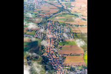 Aerial photograpy of Village with clouds from the east in Freckenfeld in the state Rhineland-Palatinate, Germany