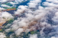 Oblique view of Wind farm at Minfeld partly in clouds in Minfeld in the state Rhineland-Palatinate, Germany