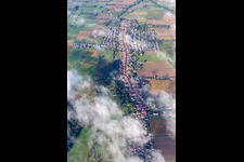 Oblique view of Village with clouds from the east in Freckenfeld in the state Rhineland-Palatinate, Germany