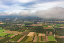 Village under autumn clouds from the south in the district Billigheim in Billigheim-Ingenheim in the state Rhineland-Palatinate, Germany