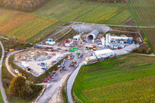 Construction site of the eastern tunnel portal for the Astrid Tunnel for the underpass and bypass of Bad Bergzabern between B38 (Weinstraße) and B427 (Kurtalstraße) in Dörrenbach in the state Rhineland-Palatinate, Germany viewn from the air