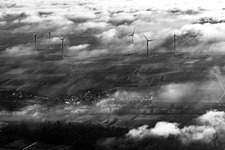 Freckenfeld wind farm at the edge of the clouds in Hergersweiler in the state Rhineland-Palatinate, Germany