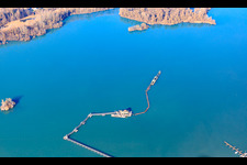 Heidelberg Materials Mineralik floating dredger in gravel pit Dettenheim-Liedolsheim in the district Liedolsheim in Dettenheim in the state Baden-Wuerttemberg, Germany