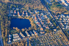 Lachenweg, sandy path by the lake in the district Hagsfeld in Karlsruhe in the state Baden-Wuerttemberg, Germany