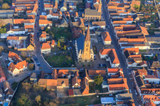 Aerial view of Catholic Church of St. Nicholas and Protestant Church Bellheim on Hauptstr in Bellheim in the state Rhineland-Palatinate, Germany