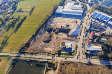 Construction site for the development of the new logistics park of HANSAINVEST and DFI-Real-Estate Kandel after demolition of the OBI market in the district Minderslachen in Kandel in the state Rhineland-Palatinate, Germany seen from a drone