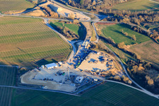 Construction site of the eastern tunnel portal for the Astrid Tunnel for the underpass and bypass of Bad Bergzabern between B38 (Weinstraße) and B427 (Kurtalstraße) in Dörrenbach in the state Rhineland-Palatinate, Germany seen from a drone