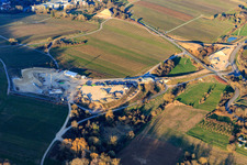 Construction site of the eastern tunnel portal for the Astrid Tunnel for the underpass and bypass of Bad Bergzabern between B38 (Weinstraße) and B427 (Kurtalstraße) in Dörrenbach in the state Rhineland-Palatinate, Germany from above
