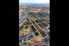 Aerial view of Development of new residential and commercial areas along Av. Rafael Escuredo Rodríguez and Menasalbas Park in Dos Hermanas in the state Seville, Spain