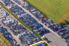 Aerial view of Rows of stacked old vehicles at the Desguace Siglo 21 scrapyard in Dos Hermanas in the state Seville, Spain