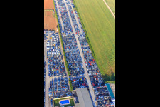 Oblique view of Rows of stacked old vehicles at the Desguace Siglo 21 scrapyard in Dos Hermanas in the state Seville, Spain