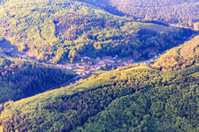 Village view in the evening in a valley of the Northern Vosges from the southeast in Soucht in the state Moselle, France