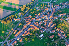 Two churches in the village center from the northwest in Vœllerdingen in the state Bas-Rhin, France