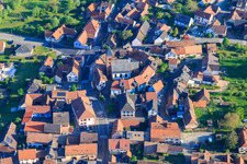 Eglise protestante luthérienne as a fortified church surrounded by a circle of houses in Dossenheim-sur-Zinsel in the state Bas-Rhin, France