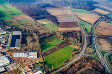 Aerial view of A65 motorway exit 20 Kandel Nord in Erlenbach bei Kandel in the state Rhineland-Palatinate, Germany