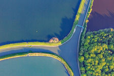 Intersection of the two canals, the Rhine-Marne Canal and the Canal des houllères de la Sarre, in the lakes Le Petit Étang and Le Grand Ruisseau with crossing for cyclists and pedestrians in Gondrexange in the state Moselle, France