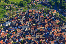 Aerial view of St. Kilian's Church in the village center in Röttingen in the state Bavaria, Germany