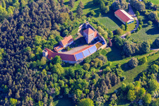 Oblique view of Brauneck Castle with photovoltaic roof in the district Niedersteinach in Creglingen in the state Baden-Wuerttemberg, Germany