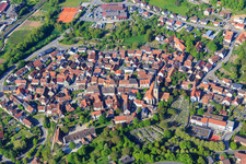 Overview of the town with the Church of St. Peter and Paul in Grünsfeld in the state Baden-Wuerttemberg, Germany