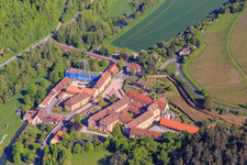 Aerial view of Hotel Kloster Bronnbach with Abbey Garden, Abbey Church of the Assumption of Mary and Missionaries of the Holy Family Monastery Bronnbach from the south in the district Bronnbach in Wertheim in the state Baden-Wuerttemberg, Germany