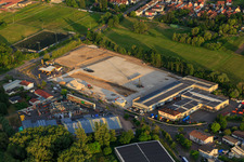 Aerial view of Construction site with foundation of the new logistics park of HANSAINVEST and DFI-Real-Estate Kandel after demolition of the OBI market in the district Minderslachen in Kandel in the state Rhineland-Palatinate, Germany