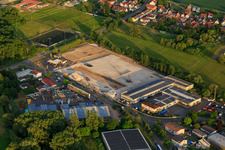 Aerial photograpy of Construction site with foundation of the new logistics park of HANSAINVEST and DFI-Real-Estate Kandel after demolition of the OBI market in the district Minderslachen in Kandel in the state Rhineland-Palatinate, Germany