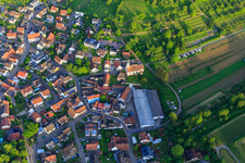 Village view with Abdeckfuchs24 GmbH and St. Sebastian Church in the district Bombach in Kenzingen in the state Baden-Wuerttemberg, Germany