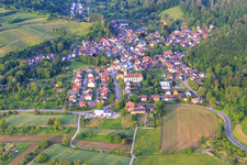 View of the wine-growing village from the west with the church of St. Hilarius in the district Bleichheim in Herbolzheim in the state Baden-Wuerttemberg, Germany