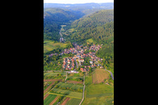 View of the winegrowing village in the Bleichtal from the west with the church of St. Hilarius in the district Bleichheim in Herbolzheim in the state Baden-Wuerttemberg, Germany