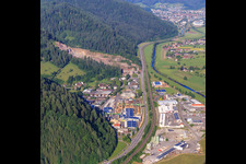 Industrial area on both sides of the B33 with Sägewerk Karl Streit GmbH & Co. KG, Kienzler Stadtmobiliar GmbH and Sievert Logistik SE in Hausach in the state Baden-Wuerttemberg, Germany