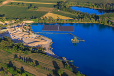 Aerial photograpy of Wyhl gravel pit with floating PV system of Hermann Uhl KG - Wyhl-Ort plant in Wyhl am Kaiserstuhl in the state Baden-Wuerttemberg, Germany